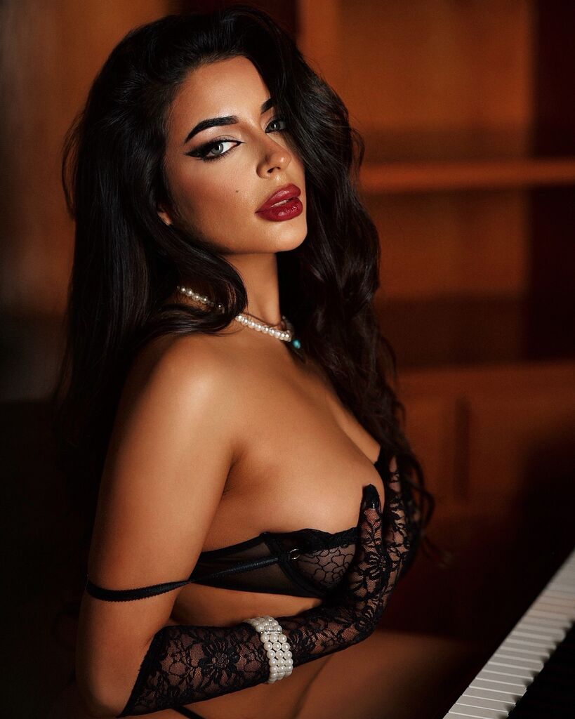 Playboy Club creator Christina Enaa is a talented poet and designer who loves Superman.